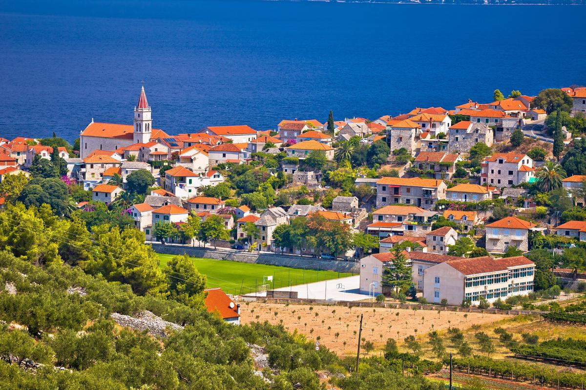 Skyline of the beautiful harbor town of Postira on Brac Island, on Croatia's Dalmatian Coast. (Goolets)