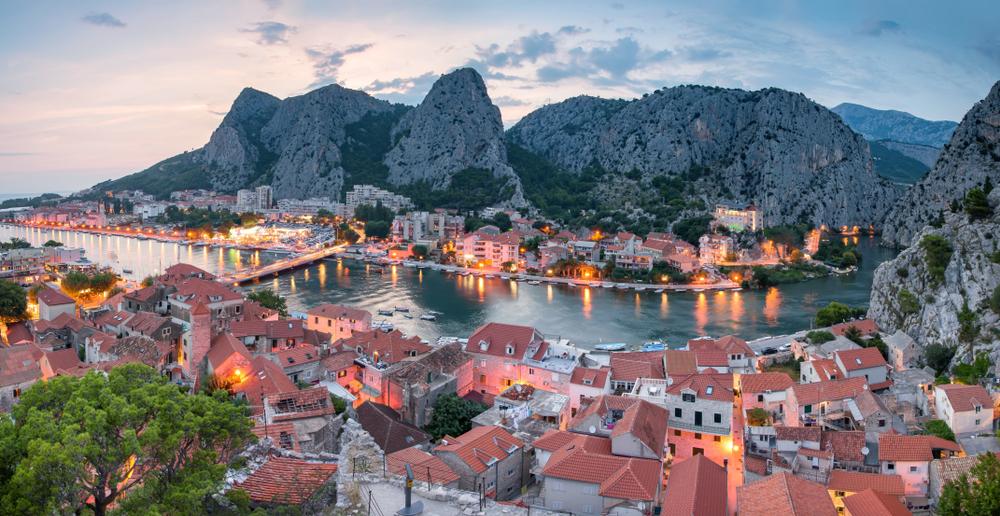 The sun sets over the historic city center of Omis, a popular destination on the Dalmatian Coast. (matkovci/Shutterstock)