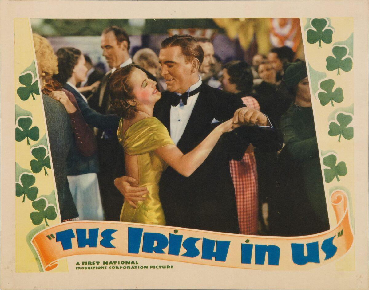 Pat O’Brien and Olivia de Havilland in a lobby card for the film "The Irish in Us." (MovieStillsDB)