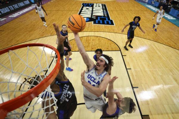 Jaime Jaquez Jr. (24) of the UCLA Bruins shoots a layup during the second half of a game against the North Carolina-Asheville Bulldogs in the first round of the NCAA Men's Basketball Tournament at Golden 1 Center in Sacramento, Calif., on March 16, 2023. (Ezra Shaw/Getty Images)