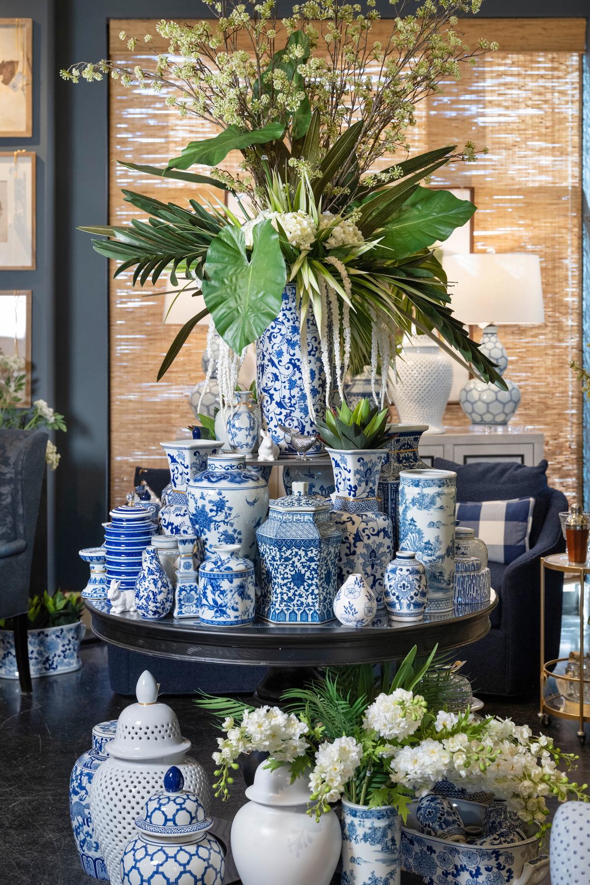 In this display, tulips, hydrangeas and drooping floral stems are the monochromatic base from which tropical greenery bursts. Monstera leaves and spiky palm fronds are mixed throughout, providing visual interest on all sides of the piece. (Handout/TNS)