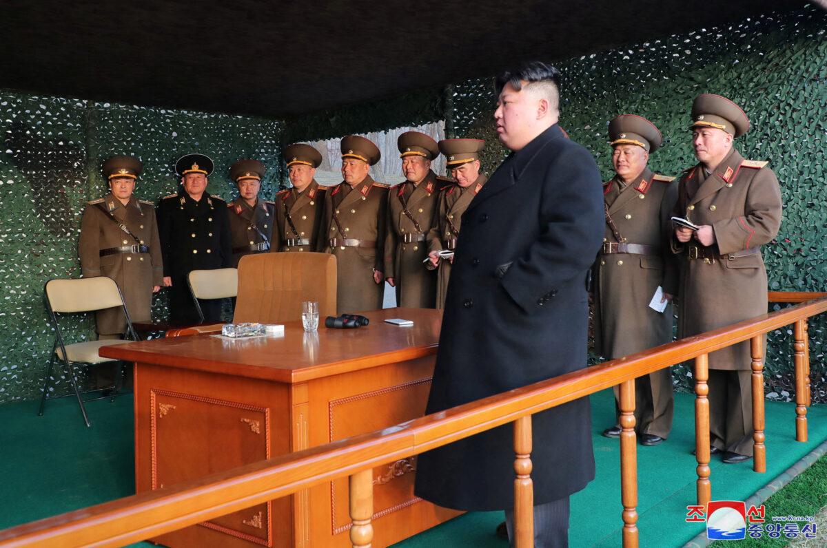North Korean leader Kim Jong-un watches a fire assault drill at an undisclosed location in North Korea on March 10, 2023. (KCNA via Reuters)