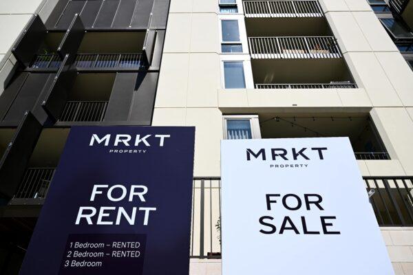 A ‘For Rent’ and a ‘For Sale’ sign is seen in Canberra, Australia, on Feb. 27, 2023. (AAP Image/Lukas Coch)