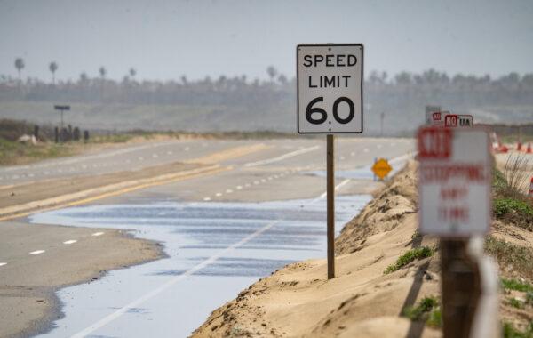 Recent storm damages lead to road closures in the Bolsa Chica area of Huntington Beach, Calif., on March 21, 2023. (John Fredricks/The Epoch Times)