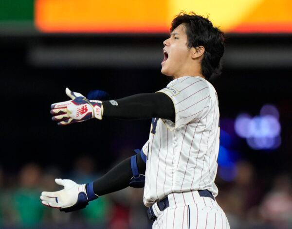Japan's Shohei Ohtani celebrates after a double during the ninth inning of a World Baseball Classic game against Mexico in Miami on March 20, 2023. (Wilfredo Lee/AP Photo)
