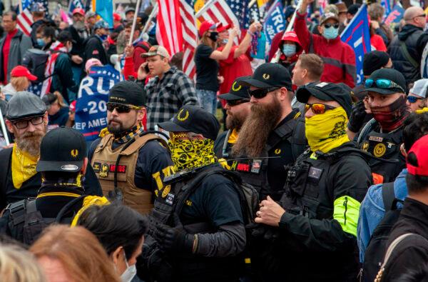 Members of the Proud Boys join supporters of President Donald Trump as they demonstrate in Washington, on Dec. 12, 2020. (Jose Luis Magana/AFP via Getty Images)