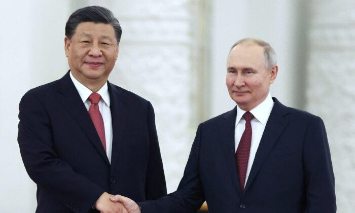 Russian President Vladimir Putin meets with Chinese leader Xi Jinping at the Kremlin in Moscow on March 21, 2023. (Sergei Karpukhin/Sputnik/AFP via Getty Images)