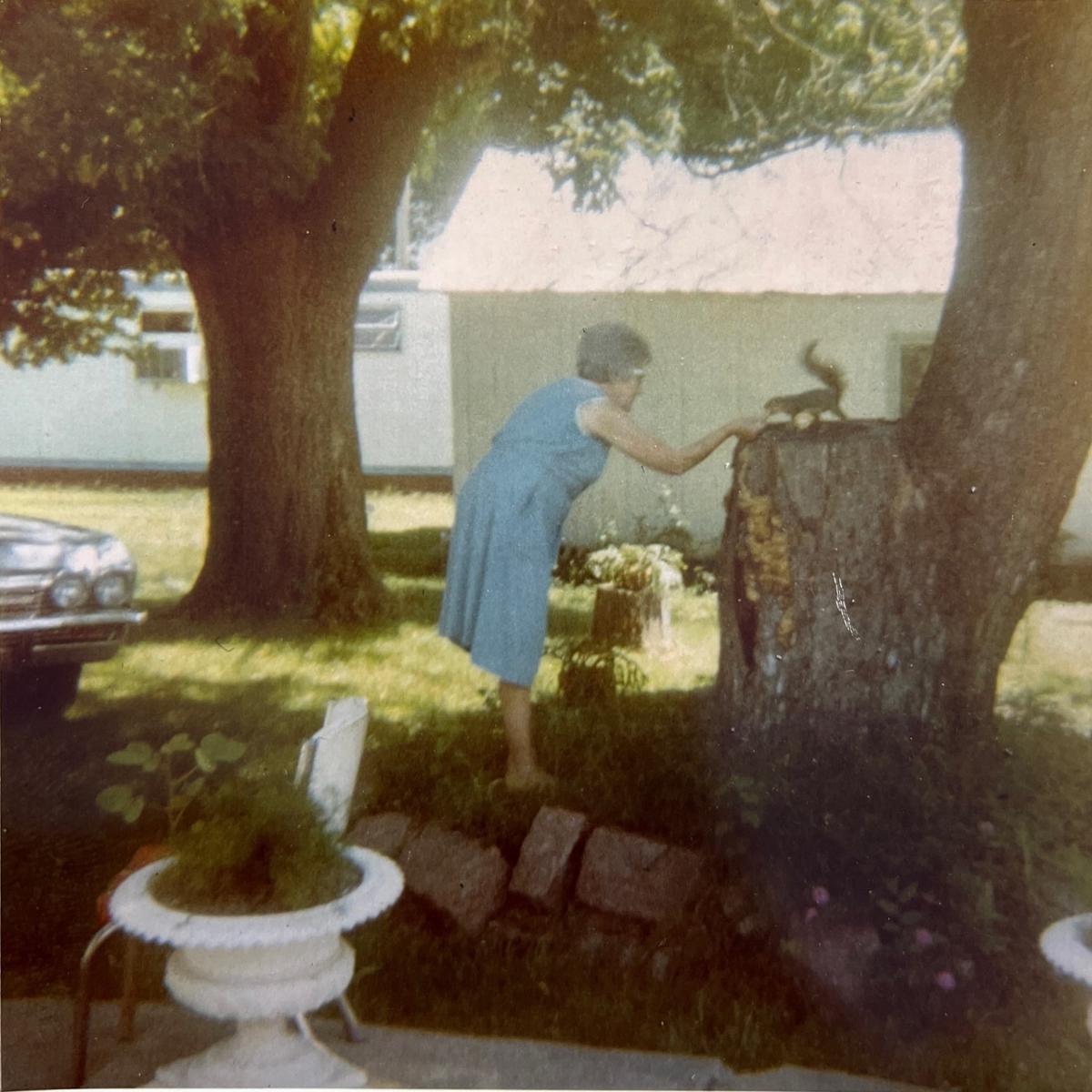 Grandma Edith's banana cookies were universally beloved—including by her backyard squirrels, pictured here eating one out of her hand. (Courtesy of Teresa Todt)