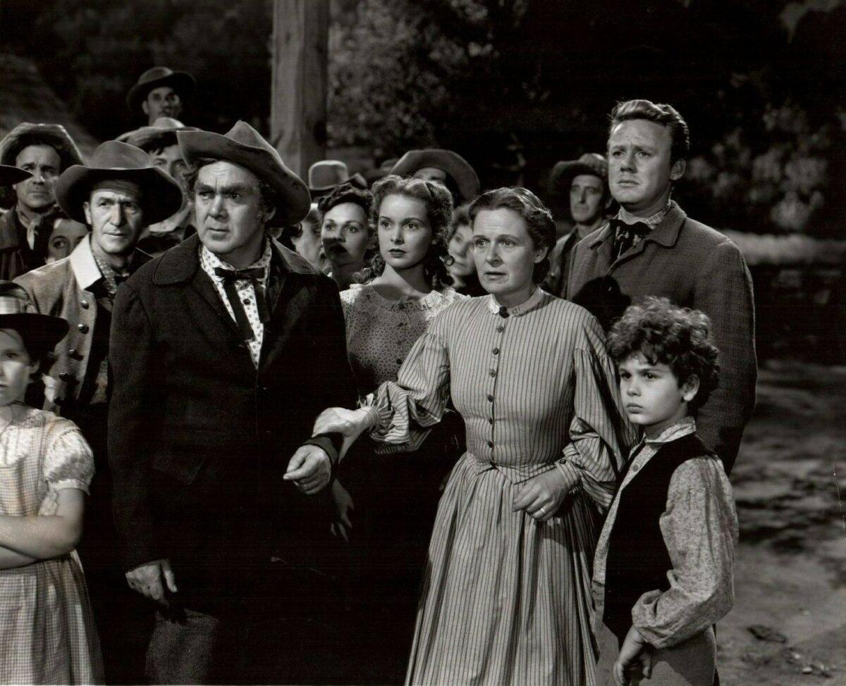 (L-R) Thomas Mitchell, Janet Leigh, Selena Royle, Van Johnson, and Dean Stockwell in "The Romance of Rosy Ridge" in a cropped publicity still. (Public Domain)
