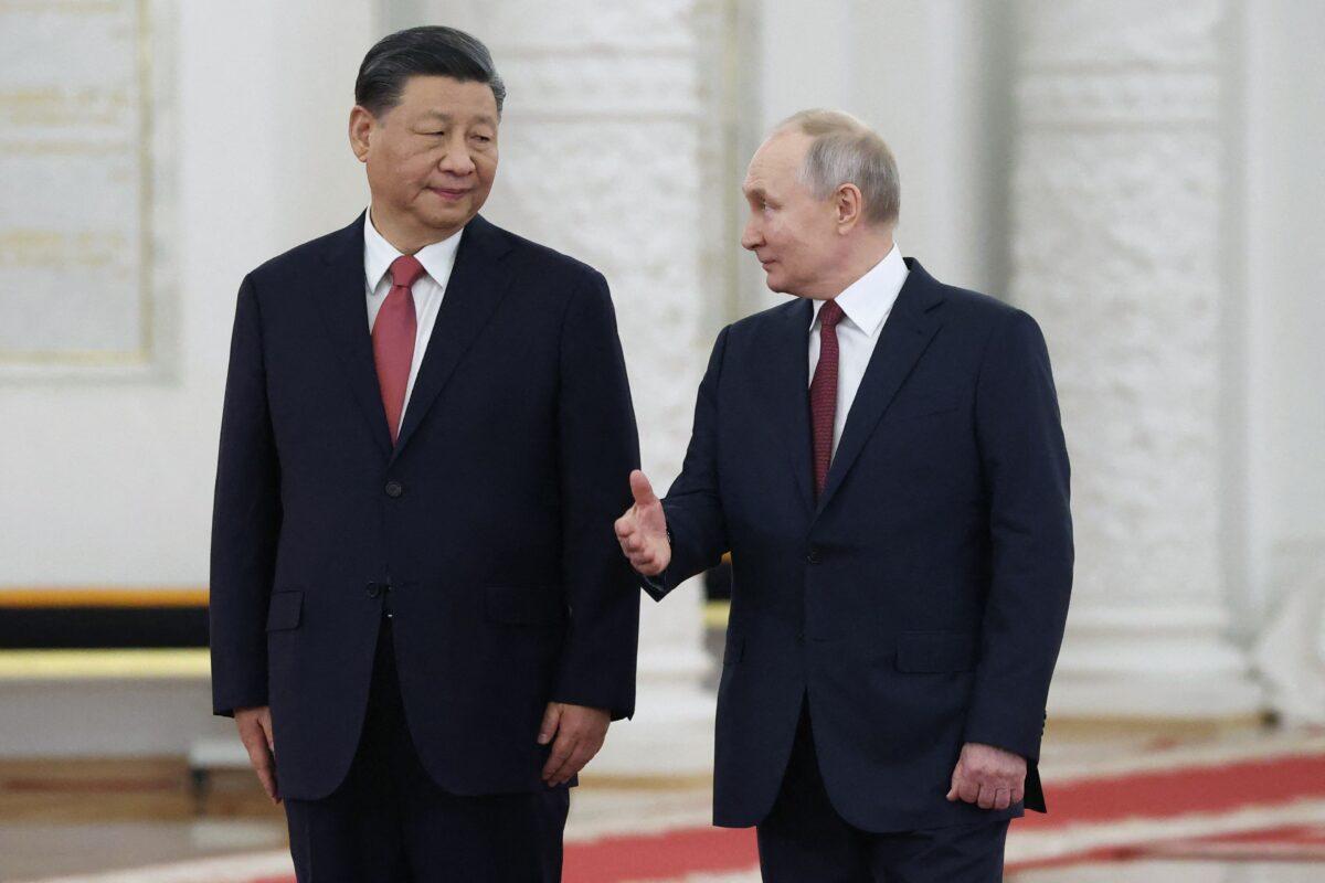 Russian President Vladimir Putin meets with Chinese leader Xi Jinping (L) at the Kremlin in Moscow on March 21, 2023. (Sergei Karpukhin/Sputnik/AFP via Getty Images)