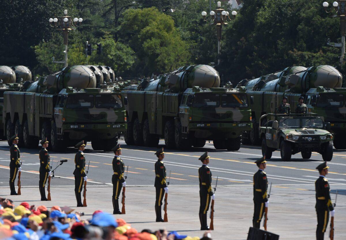 Military vehicles carrying DF-21D intermediate-range anti-ship ballistic missiles participate in a military parade at Tiananmen Square in Beijing on Sept. 3, 2015, to mark the 70th anniversary of victory over Japan and the end of World War II. (Greg Baker/AFP via Getty Images)