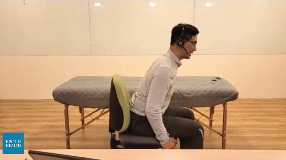 Step two to proper sitting posture: Sit all the way back in your chair. (The Epoch Times)