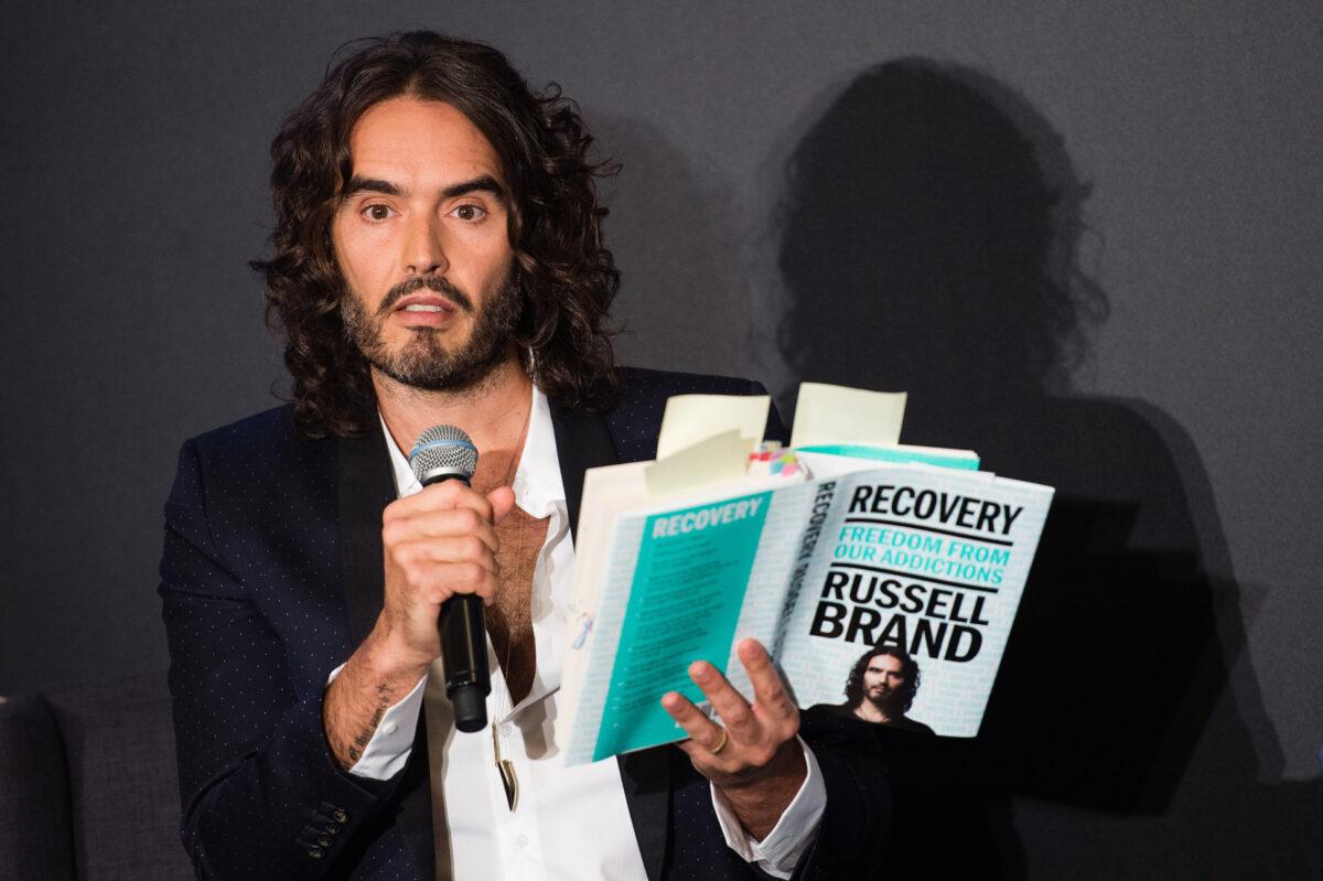 Russell Brand takes part in a discussion at Esquire Townhouse, Carlton House Terrace, in London, England, on Oct. 14, 2017. (Jeff Spicer/Getty Images)