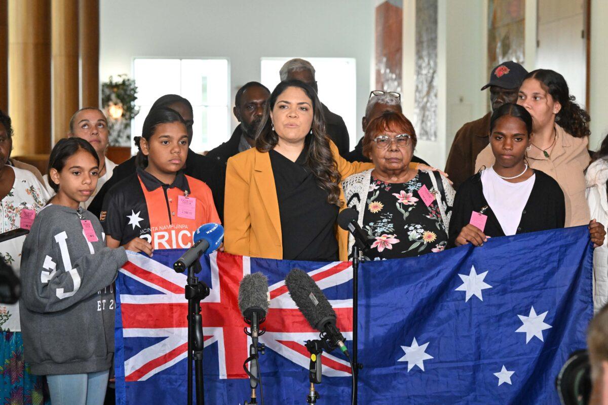 Country Liberal Party senator Jacinta Nampijinpa Price and 22 Indigenous community leaders at a press conference at Parliament House in Canberra, Australia, on March 22, 2023. (AAP Image/Mick Tsikas)