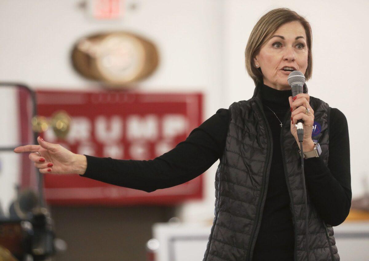 Iowa Gov. Kim Reynolds speaks at a campaign event for Sen. Joni Ernst (R-Iowa) at Dahl Auto Museum as part of Ernst's RV tour of Iowa, in Davenport on Oct. 31, 2020. (Mario Tama/Getty Images)