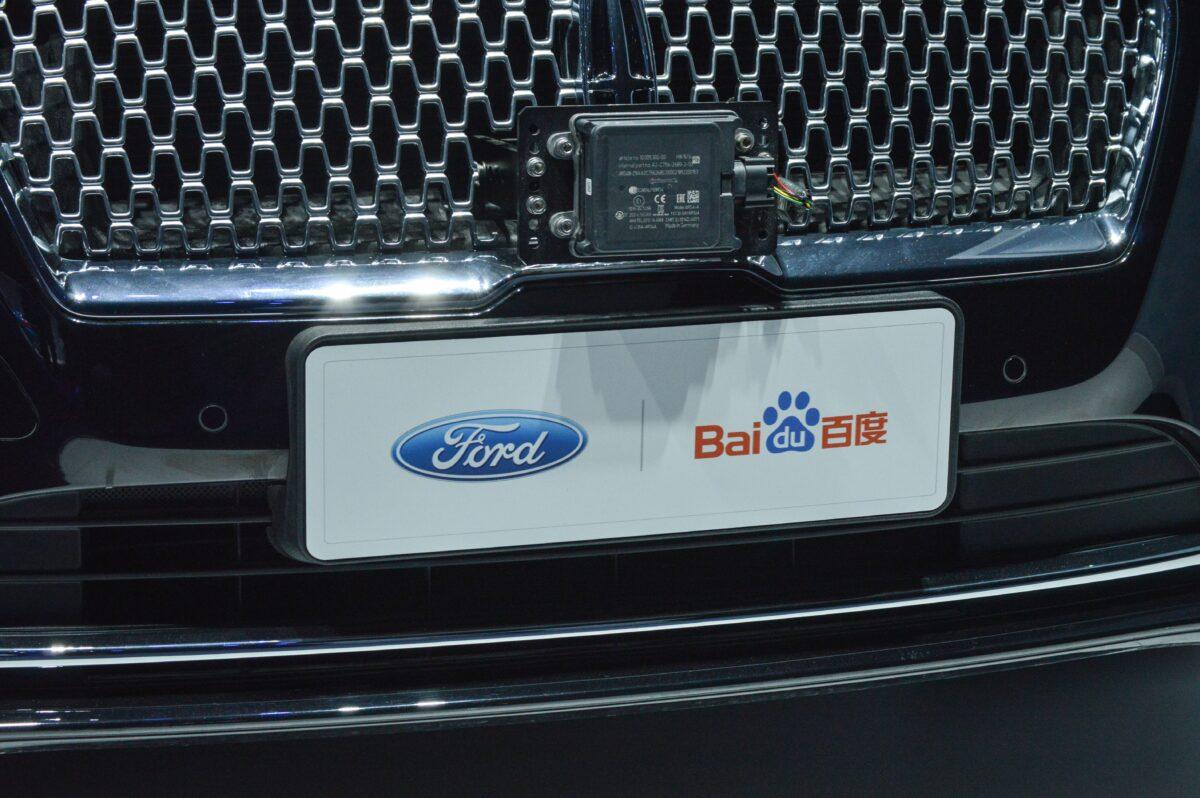 Logos of Ford and Baidu on a Ford license plate during a press conference ahead of the Shanghai Auto Show on April 3, 2019. ( Kelly Wang/AFP via Getty Images)