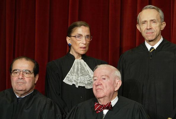 Supreme Court Justices (L–R) Associate Justice Antonin Scalia, Associate Justice Ruth Bader Ginsberg, Associate Justice John Paul Stevens, and Associate Justice David H. Souter at the U.S. Supreme Court in 2003, in Washington. (Mark Wilson/Getty Images)