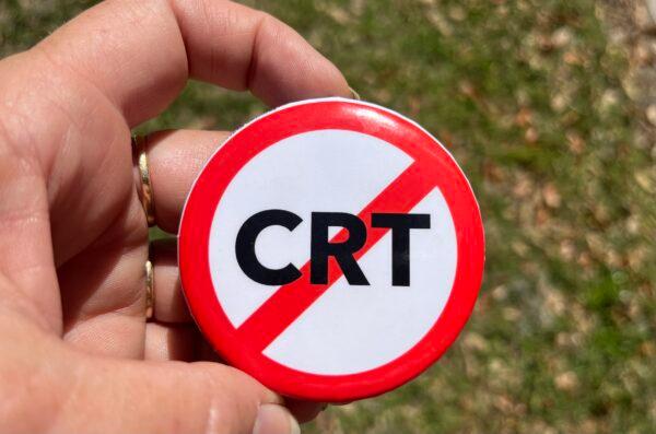  Parents concerned about critical race theory (CRT) took home buttons like this from a school board activist training put on by the The Leadership Institute in Sarasota, Fla., on Jan. 19, 2022. (Nanette Holt/The Epoch Times)