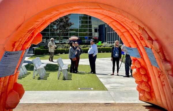 Providence St. Joseph Hospital hosts a colon cancer awareness event featuring a giant inflatable colon that displayed the textures of the various cancer types that affect the organ in Orange, Calif., on March 24, 2023. (John Fredricks/The Epoch Times)