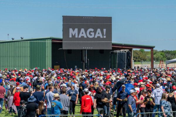 People wait in line at the Waco Regional Airport ahead of former U.S. President Donald Trump's arrival, in Waco, Texas, on March 25, 2023. (Brandon Bell/Getty Images)