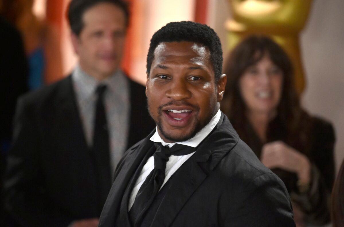 Jonathan Majors arrives at the Oscars at the Dolby Theatre in Los Angeles on March 12, 2023. (Richard Shotwell/Invision/AP)