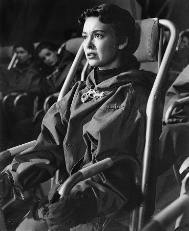 Barbara Rush is wheelchair bound but hopes for a miracle, in "The First Legion." (Public Domain)
