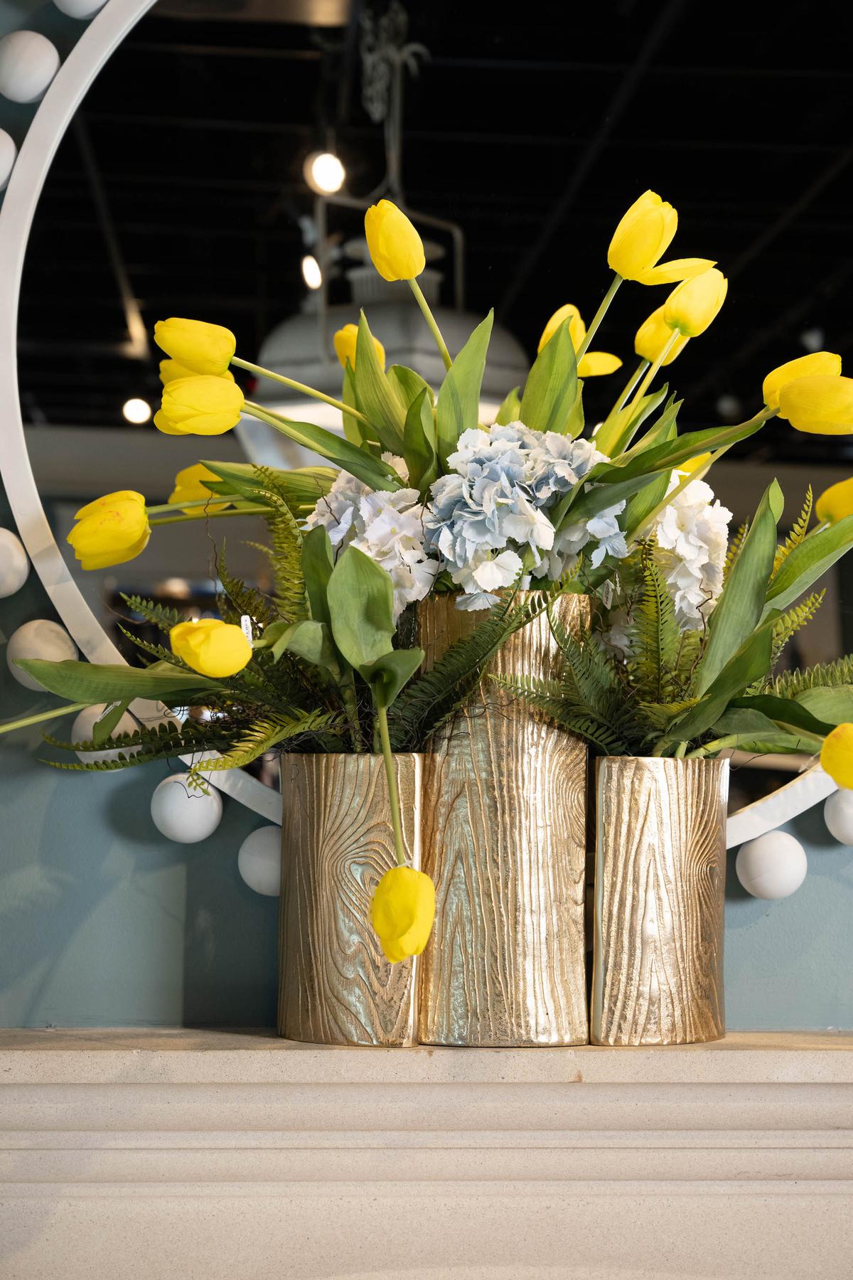 Selecting the right vessel for a floral arrangement is just as important as choosing the right stems. (Handout/TNS)