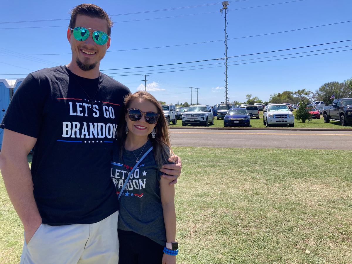Brandon Wyrick, 32, of Austin, Texas, and Cassidy Diaz, 31, of Waco, Texas, wear "Let's Go Brandon" T-shirts as they head to a rally for former President Donald Trump in Waco, Texas, on March 25, 2023. (Janice Hisle/The Epoch Times)