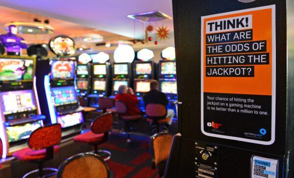 This photo taken shows a warning sign for gamblers posted at the Randwick Labor Club in Sydney, Australia, on Dec. 21, 2012. (William West/AFP via Getty Images)