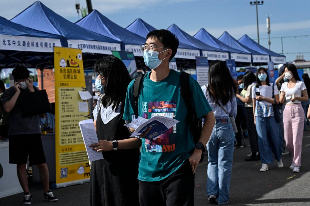A job fair in Beijing on Aug. 26, 2022. China's slowing economy has left millions of young people fiercely competing for an ever-slimming raft of jobs and facing an increasingly uncertain future. (Jade Gao/AFP via Getty Images)