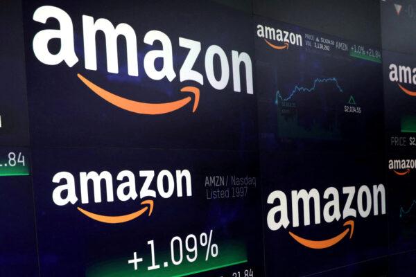 The Amazon.com logo and stock price information is seen on screens at the Nasdaq Market Site in New York on Sept. 4, 2018. (Mike Segar/Reuters)