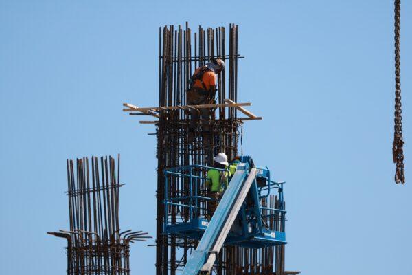 Construction workers on a job site in Miami , Fla., on March 10, 2023. (Joe Raedle/Getty Images)