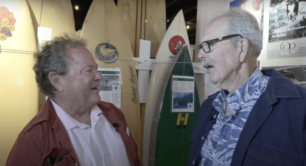 O.P. Co-founder Jim Jenks (R) speaking with International Surfing Museum host Peter Townsend (L). (Courtesy of the City of Huntington Beach)