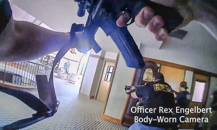 This image shows bodycam footage of police responding to a shooting at The Covenant School in Nashville, Tenn., on March 27, 2023. (Metropolitan Nashville Police Department via AP)