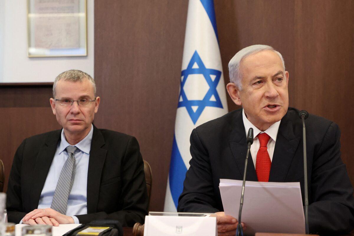Israeli Prime Minister Benjamin Netanyahu (R) chairs a weekly cabinet meeting, flanked by Justice Minister Yariv Levin, at the prime minister's office in Jerusalem on March 5, 2023. (Gil Cohen-Magen/POOL/AFP via Getty Images)