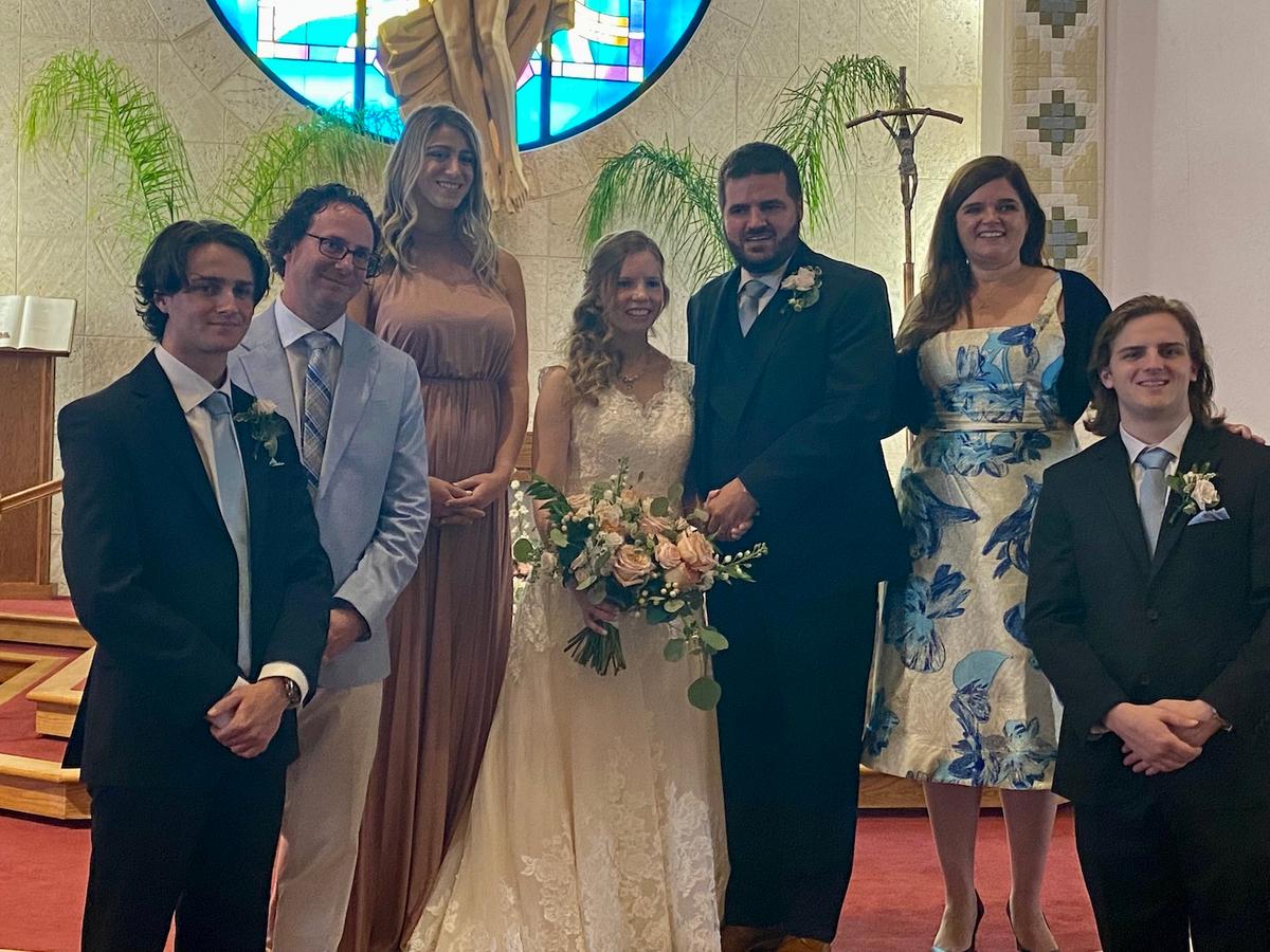 Kathleen with her husband and children at Nathan's wedding. (Courtesy of Kathleen Folan)