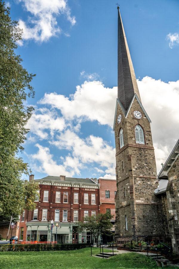 The spire of the Grace Episcopal Church on North Street in downtown Middletown, N.Y., on Sept. 13, 2022. (Petr Svab/The Epoch Times)