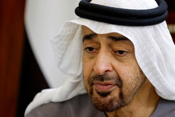 Newly appointed president of the United Arab Emirates Sheikh Mohammed bin Zayed Al Nahyan receives condolences from French President Emmanuel Macron on the death of Sheikh Khalifa Bin Zayed Al Nahyan at Al Mushrif Palace in Abu Dhabi, United Arab Emirates, on May 15, 2022. (Christian Hartmann, Pool via AP)