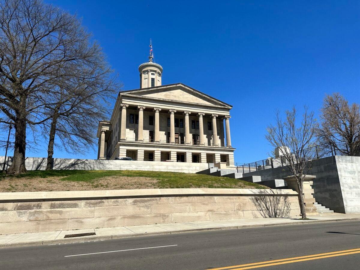The flag atop the Tennessee State Capitol in Nashville flew at half-staff on March 29, 2023, two days after six people were killed at The Covenant School in a shooting. (Chase Smith/The Epoch Times)