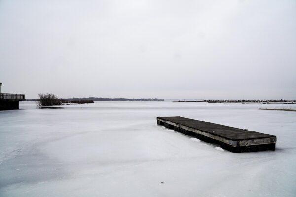 Lake Champlain in New York was still frozen over on March 23, 2023. (Allan Stein/The Epoch Times)