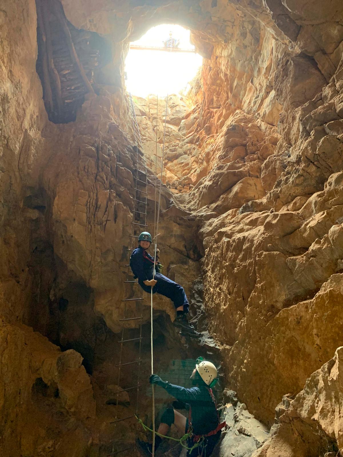 Researchers from Flinders University descend into a cave located in South Australia's Flinders Range. (Courtesy of Aaron Camens)
