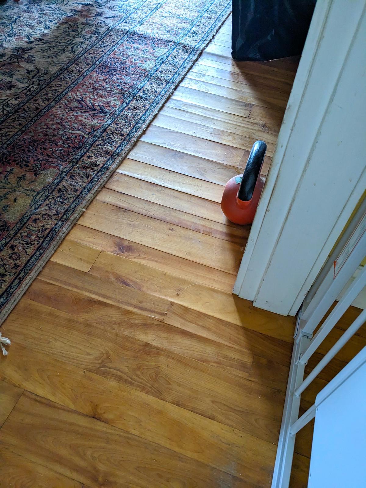 Water dripping silently through the night caused thousands of dollars of damage, including warping this hardwood floor. (Tim Carter/TNS)