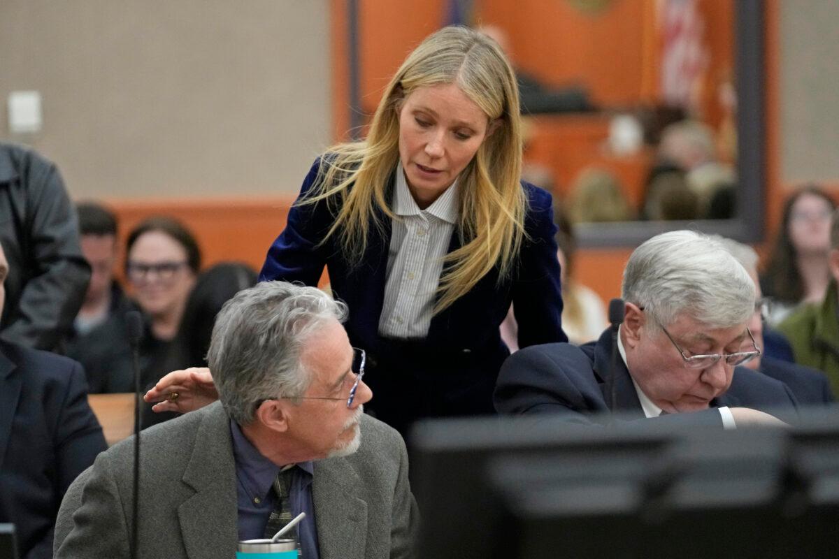 Gwyneth Paltrow speaks with retired optometrist Terry Sanderson (L) as she walks out of the courtroom following the reading of the verdict in their lawsuit trial in Park City, Utah, on March 30, 2023. (Rick Bowmer/AP Photo, Pool)