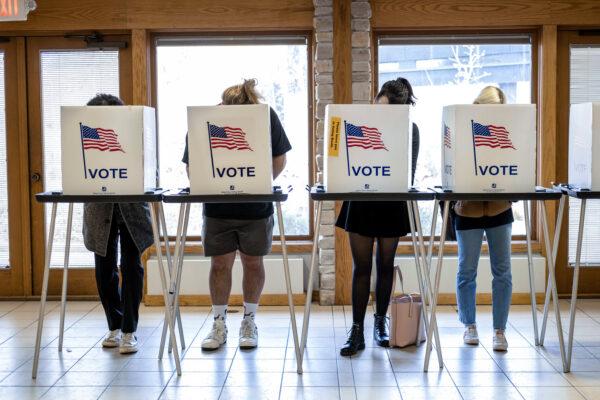 Voters mark their ballots at the Olbrich Botanical Gardens polling place in Madison, Wis., on Nov. 8, 2022. (Jim Vondruska/Getty Images)