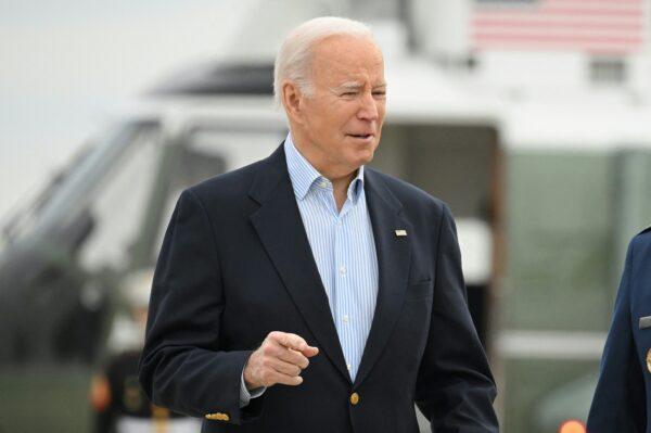 President Joe Biden makes his way to board Air Force One before departing from Joint Base Andrews in Maryland on March 31, 2023. (Mandel Ngan/AFP via Getty Images)