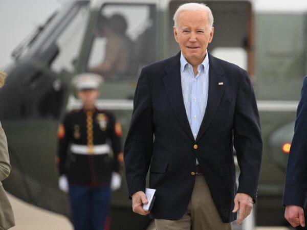 President Joe Biden makes his way to board Air Force One before departing from Joint Base Andrews in Md. on March 31, 2023. (Mandel Ngan/AFP via Getty Images)