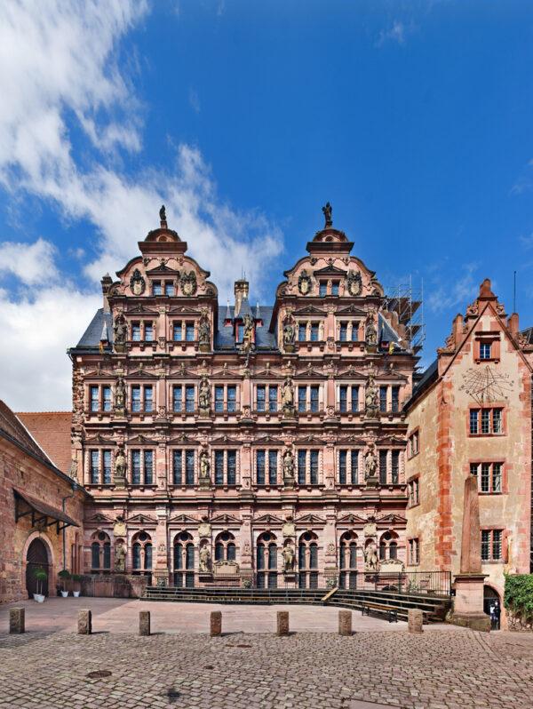 Visitors entering the main courtyard of Heidelberg Castle will notice the eye-catching Friedrich Wing. The building was restored in the 1900s, and both the exterior and interior are close to the original look, in the Renaissance Revival style. The exterior features a black-gabled roof and a sandstone-elevated façade, richly decorated with Renaissance-style windows and sculptures. Friedrich IV displayed his power and his family’s heritage through carved sculptures of his ancestors, prince-electors of the Holy Roman Empire. (<a href="https://www.shutterstock.com/g/karambol">Khirman Vladimir</a>/<a href="https://www.shutterstock.com/image-photo/friedrichsbau-heidelberg-castle-germany-5731579">Shutterstock</a>)