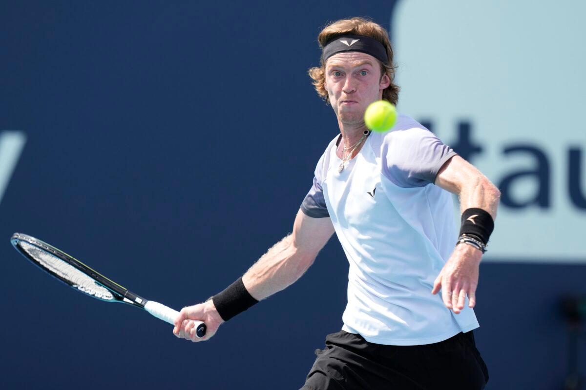 Andrey Rublev returns to Jannik Sinner of Italy during the Miami Open tennis tournament in Miami Gardens, Fla., on March 28, 2023. (Marta Lavandier/AP Photo)