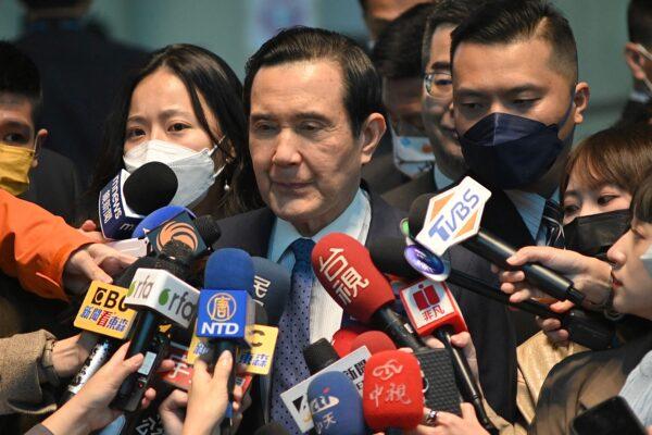 Taiwan's former president Ma Ying-jeou (C) speaks to journalists before his visit to China from the Taoyuan international airport on March 27, 2023. (Sam Yeh/AFP via Getty Images)