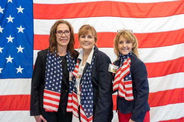 (L–R) Darcy Eiche, Joanne Sullivan, and LisaMarie Hintze coordinated the event honoring Vietnam War veterans in Newburgh, N.Y., on April 1, 2023. (Cara Ding/The Epoch Times)